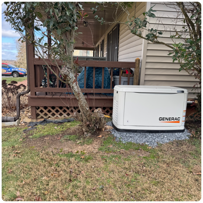 The Generator Stands Next To The House Out Of The Way